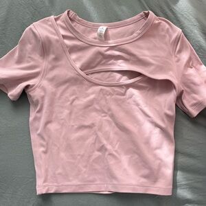 Light baby pink Lululemon cutout crop workout top. like new, only worn twice.